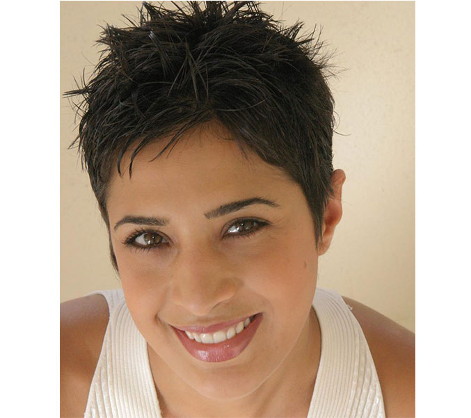 Dr. Leila Zamiri, smiling, in a portrait taken for the practice.